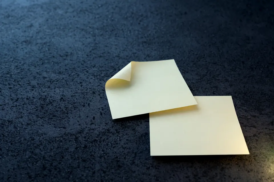 Two blank sticky notes